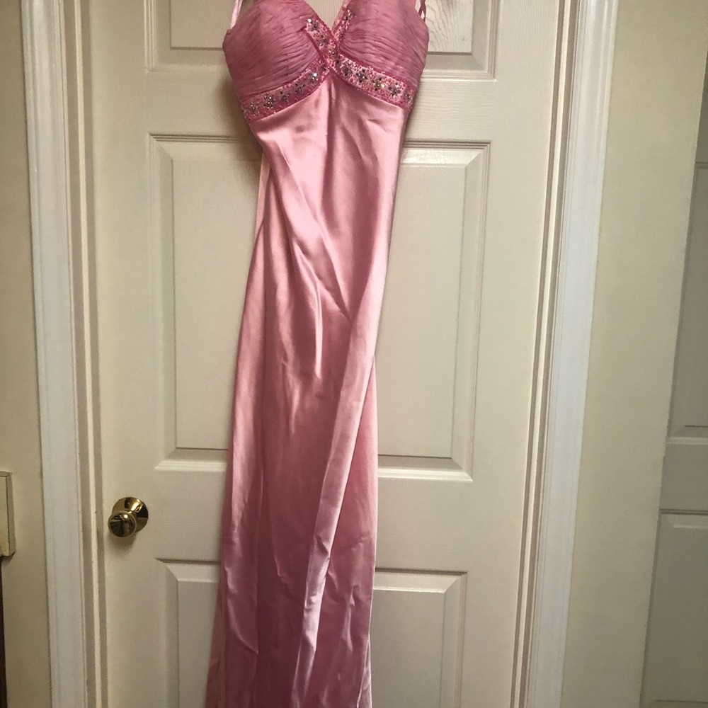 Beautiful prom dress worn one time.  May need cleaning.  Size not listed.